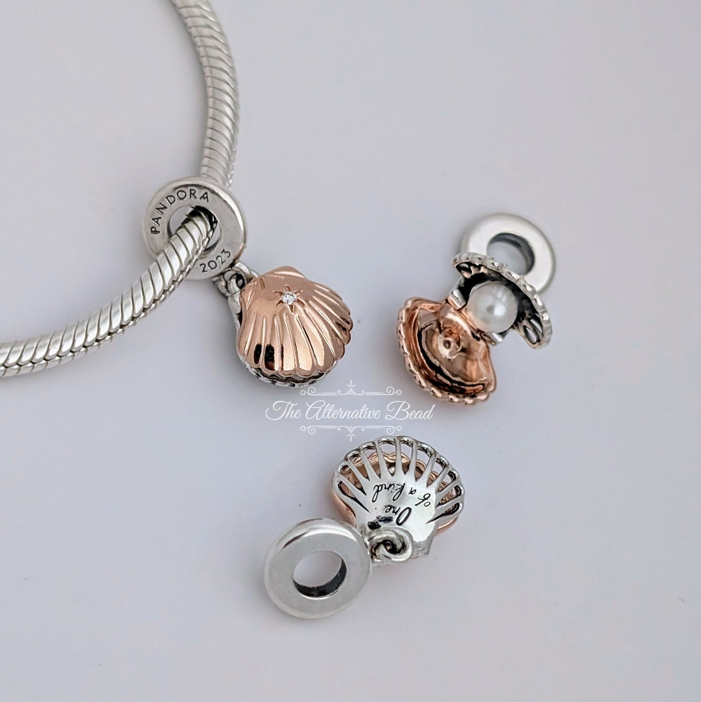 Pandora Seashell & Treated Freshwater Cultured Pearl Two Tone Club 2023 Dangle rose-gold; silver sterling-silver; rose-gold Dangle by The Alternative Bead. Your official Pandora Retailer from Germany