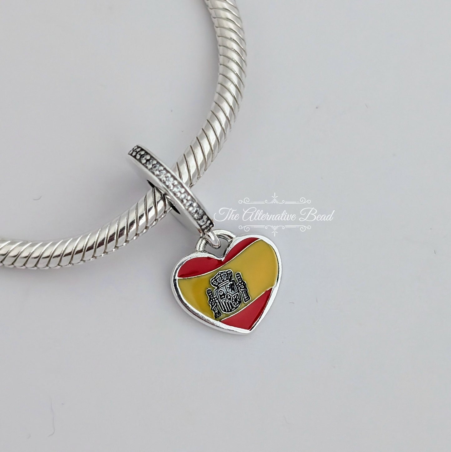 Pandora Spanish Flag Heart Dangle yellow; red; silver sterling-silver; enamel Dangle by The Alternative Bead. Your official Pandora Retailer from Germany