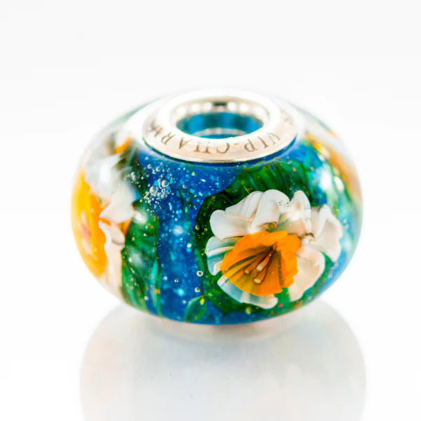 VIP-CHARMS Daffodil Paradise Bead blue; green; white; orange glass Bead by The Alternative Bead. Your official VIP-CHARMS Retailer from Germany