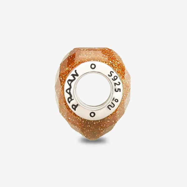 Praan Shimmering Faceted Goldstone Heart Charm gold natural-stone Bead by The Alternative Bead. Your official Praan Retailer from Germany