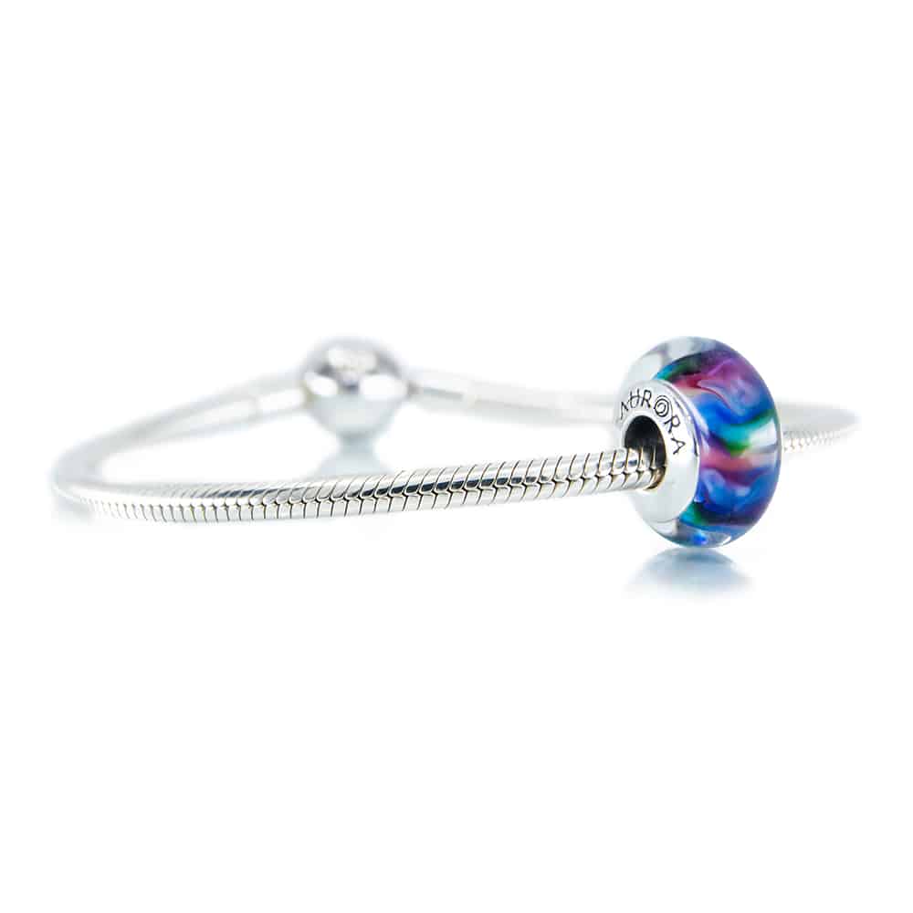 Aurora Charm Sparks of Wonder Glass Bead LE blue; purple; pink glass Bead by The Alternative Bead. Your official Aurora Charm Retailer from Germany