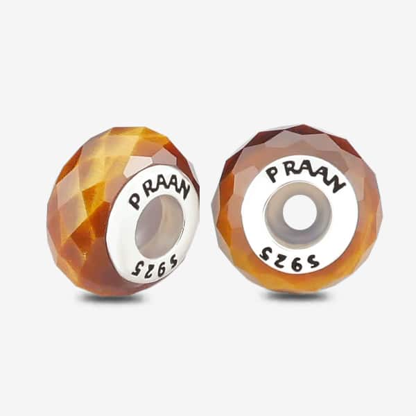 Praan Tiger Eye Stopper Charms brown and bronze and orange natural-stone Stopper by The Alternative Bead. Your official Praan Retailer from Germany