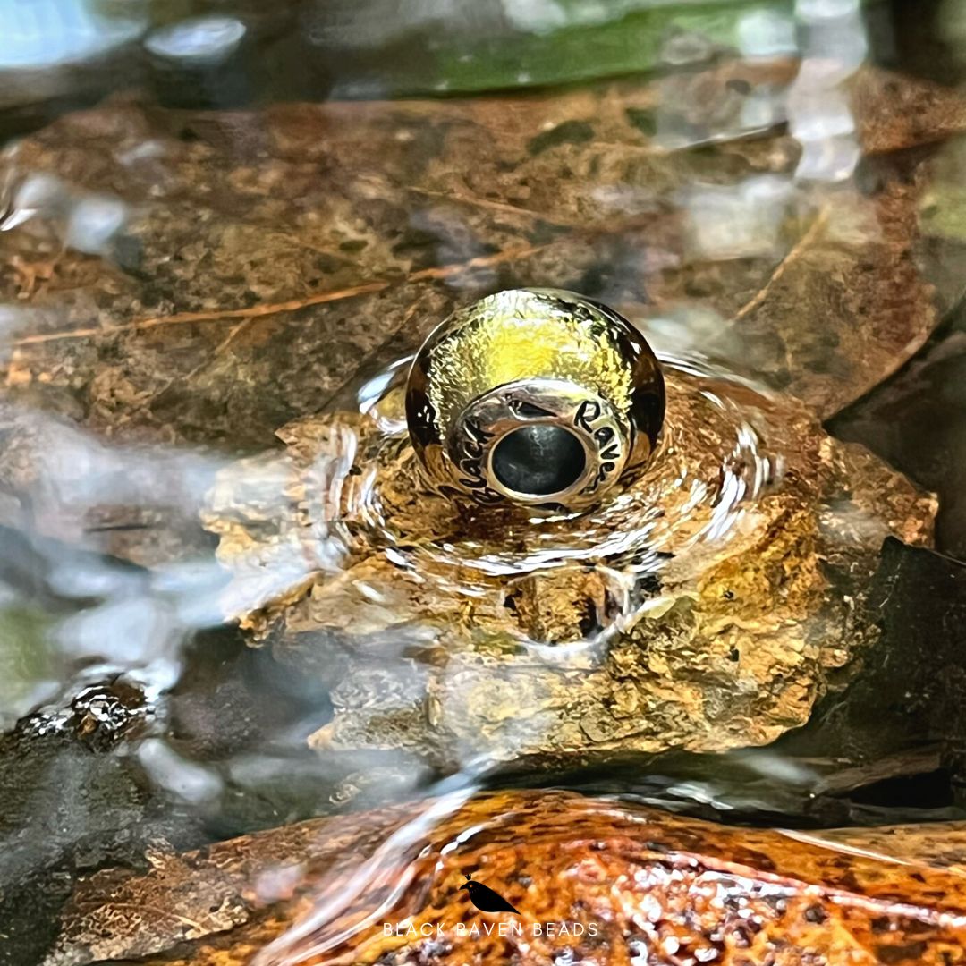 Black Raven Beads Reflect (LE) silver and gold glass Charm by The Alternative Bead. Your official Black Raven Beads Retailer from Germany