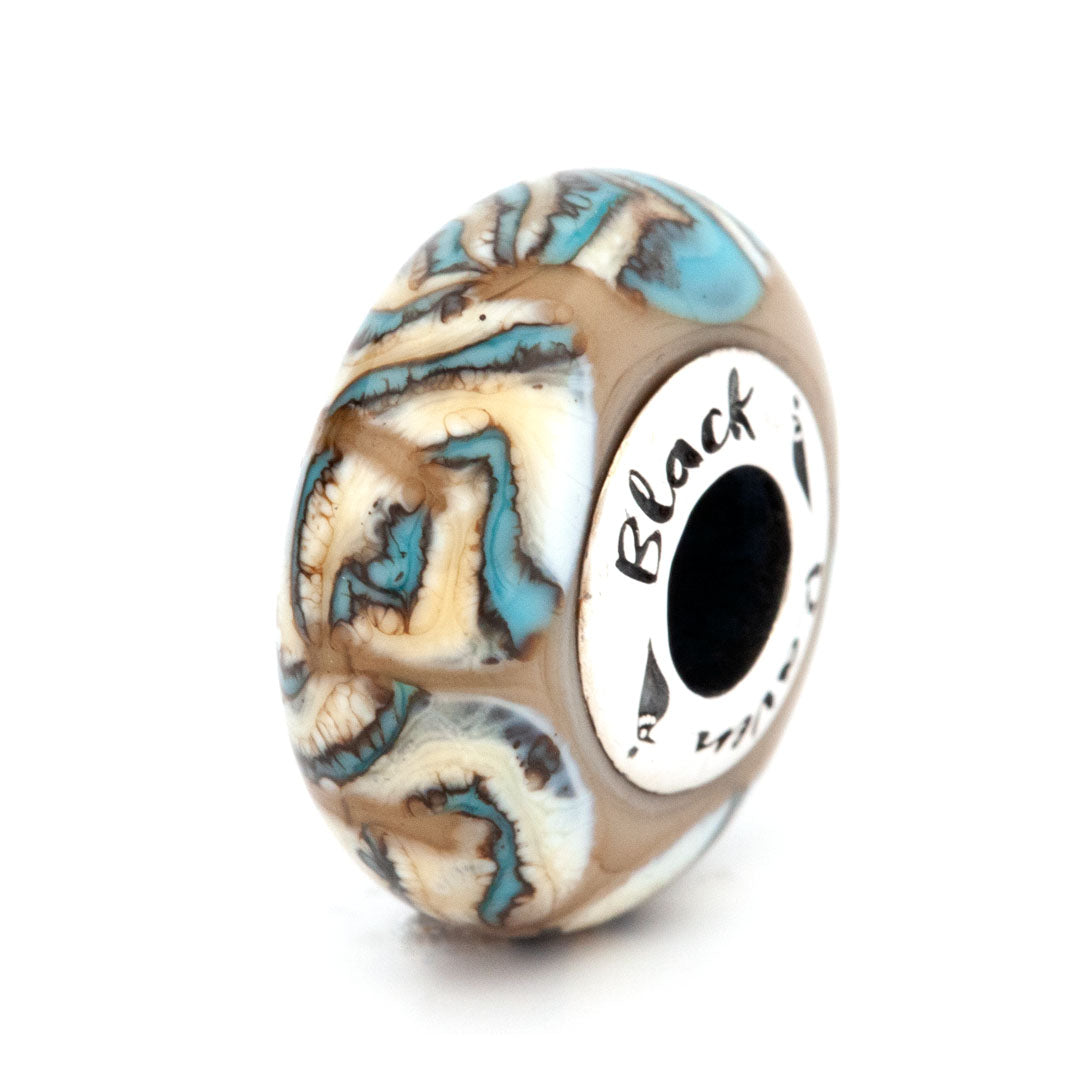 Black Raven Beads Sea Tides brown and white and blue glass Charm by The Alternative Bead. Your official Black Raven Beads Retailer from Germany