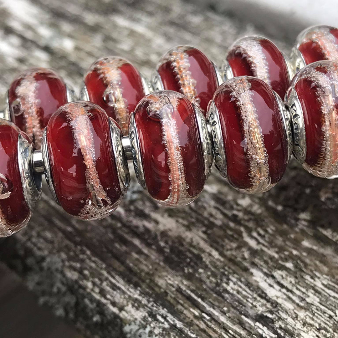 Black Raven Beads Hot Broth red and brown glass Charm by The Alternative Bead. Your official Black Raven Beads Retailer from Germany