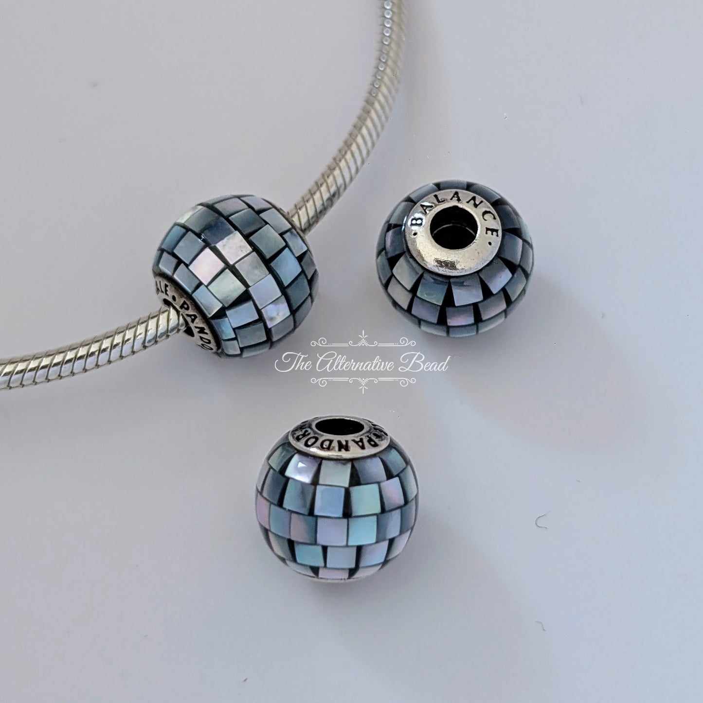 Pandora Essence Balance Charm blue mother-of-pearl Bead by The Alternative Bead. Your official Pandora Retailer from Germany