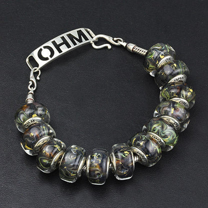 OHM Beads Autumn Glimmers black glass Bead by The Alternative Bead. Your official OHM Beads Retailer from Germany