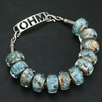 OHM Beads The Other Side Will Always Reveal Itself  glass Bead by The Alternative Bead. Your official OHM Beads Retailer from Germany