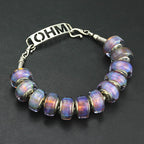 OHM Beads GOTM NO. 52 Whispers From Midnight purple and pink glass Bead by The Alternative Bead. Your official OHM Beads Retailer from Germany