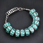 OHM Beads Wave of Mystery blue glass Bead by The Alternative Bead. Your official OHM Beads Retailer from Germany
