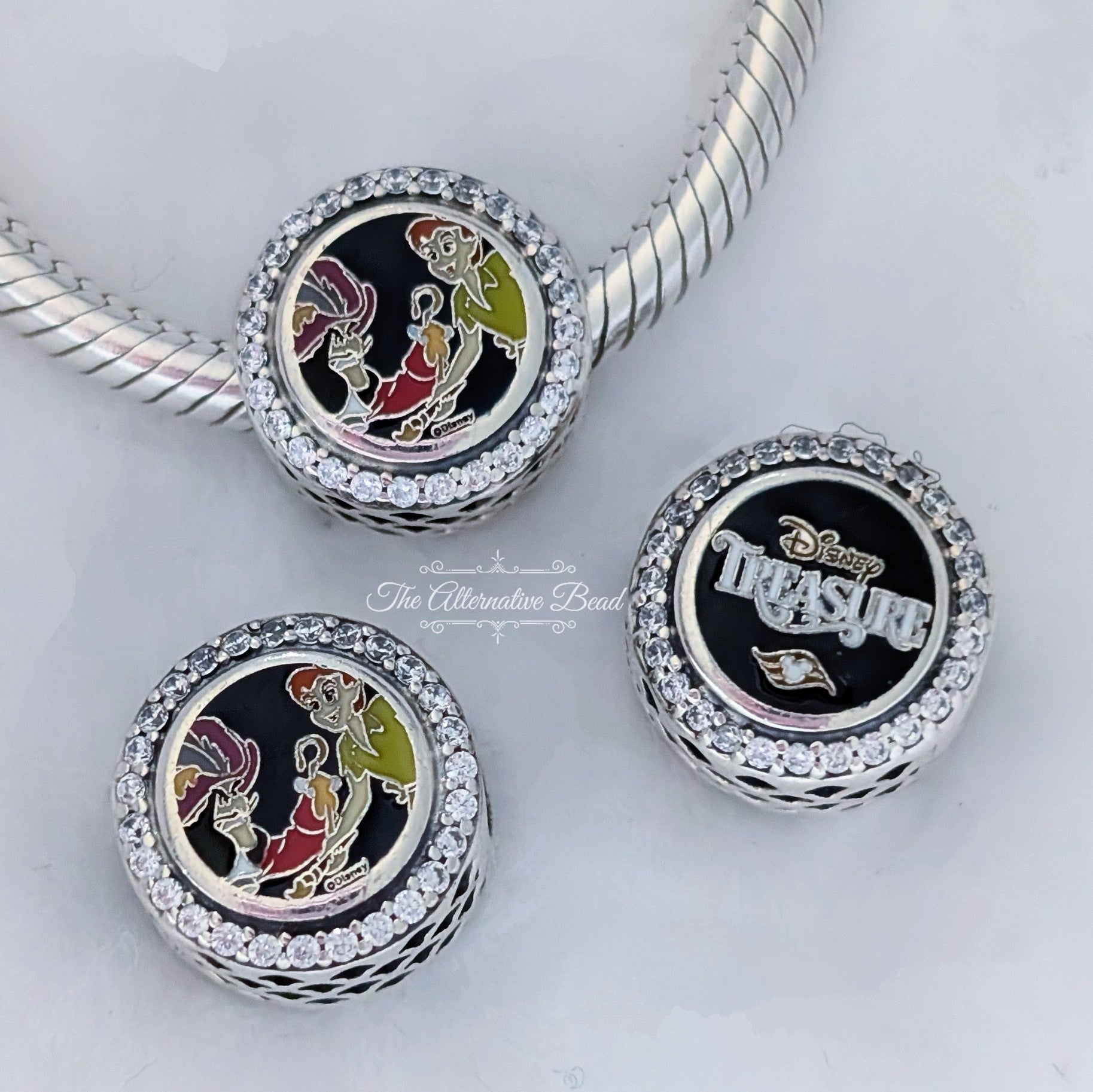 Disney x Pandora Disney Cruise Line Treasure Peter Pan & Captain Hook Charm silver; multicolor; green; red; black sterling-silver; enamel Collectors Set by The Alternative Bead. Your official Disney x Pandora Retailer from Germany