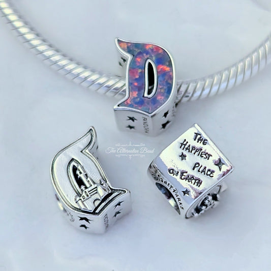 Disney x Pandora D Disneyland Logo Charm multicolor; silver; pink; purple sterling-silver; enamel Bead by The Alternative Bead. Your official Disney x Pandora Retailer from Germany