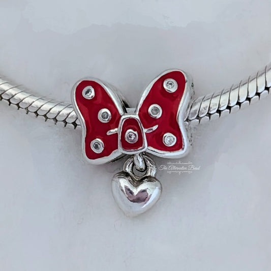 Disney x Pandora Disney Parks Minnie bow Charm silver; red sterling-silver; enamel Bead by The Alternative Bead. Your Jewelry Retailer from Germany