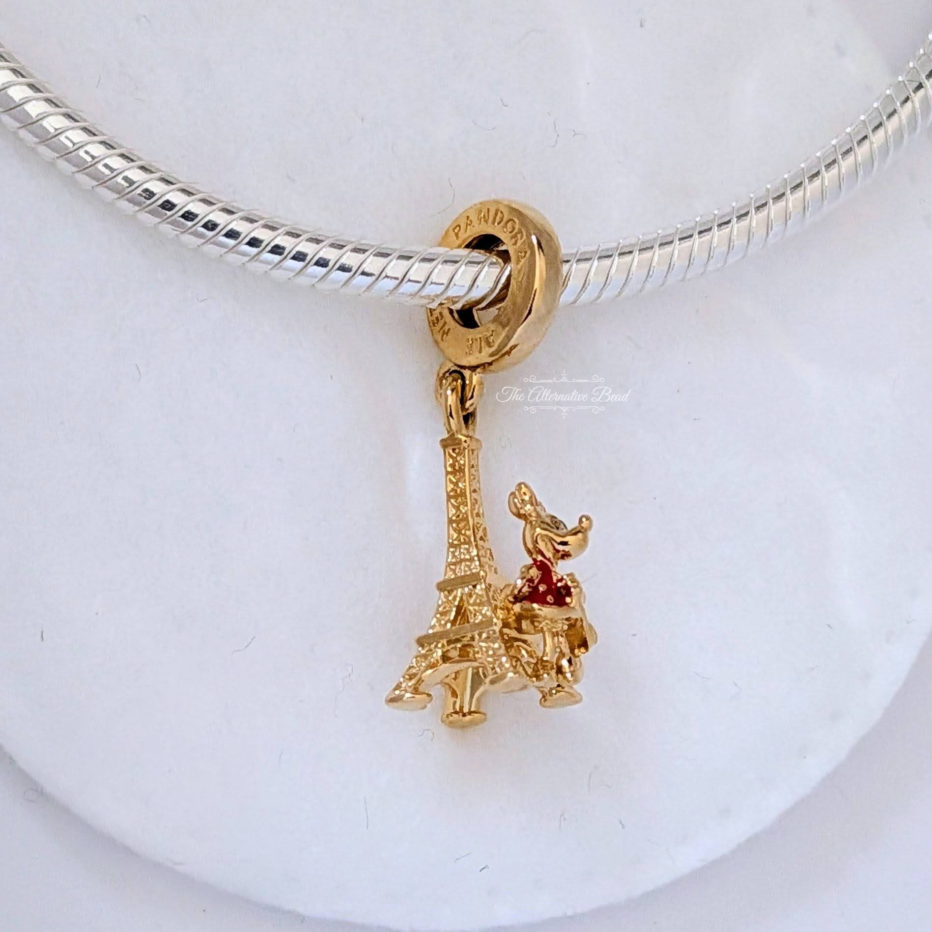 Disney x Pandora Minnie Mouse Eiffel Tower Dangle 14k Gold Plating gold; red gold-plated Dangle by The Alternative Bead. Your Jewelry Retailer from Germany