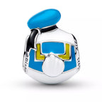 Silver charm with blue and yellow accents on a white background