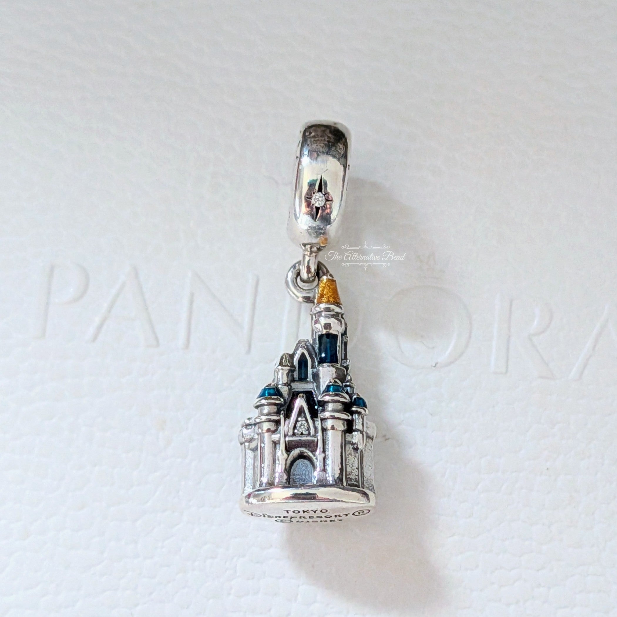 Disney x Pandora Exclusive Disneyland Tokyo Castle Dangle silver and blue and gold sterling-silver and enamel Dangle by The Alternative Bead. Your Jewelry Retailer from Germany
