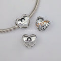 Pandora Paris 2024 Paralympic Games Heart Charm (793468C01) silver and black and gold sterling-silver and resin Bead by The Alternative Bead. Your Jewelry Retailer from Germany