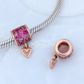 Pandora Retired 14K Rose Gold-Plated Freehand Heart Barrel Charm with Synthetic Red Ruby (789548C01) rose-gold and pink and red sterling-silver and rose-gold Bead by The Alternative Bead. Your Jewelry Retailer from Germany