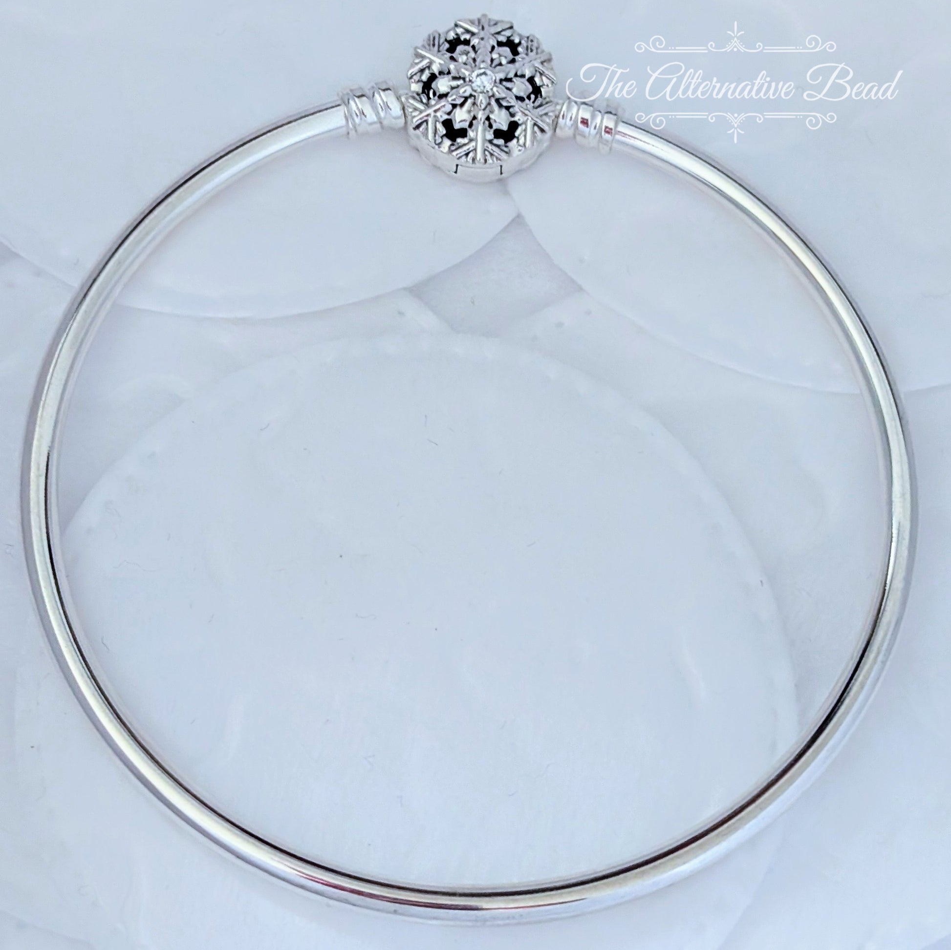 Pandora Moments Sparkling Snowflake Clasp Bangle silver sterling-silver Bangle by The Alternative Bead. Your official Pandora Retailer from Germany