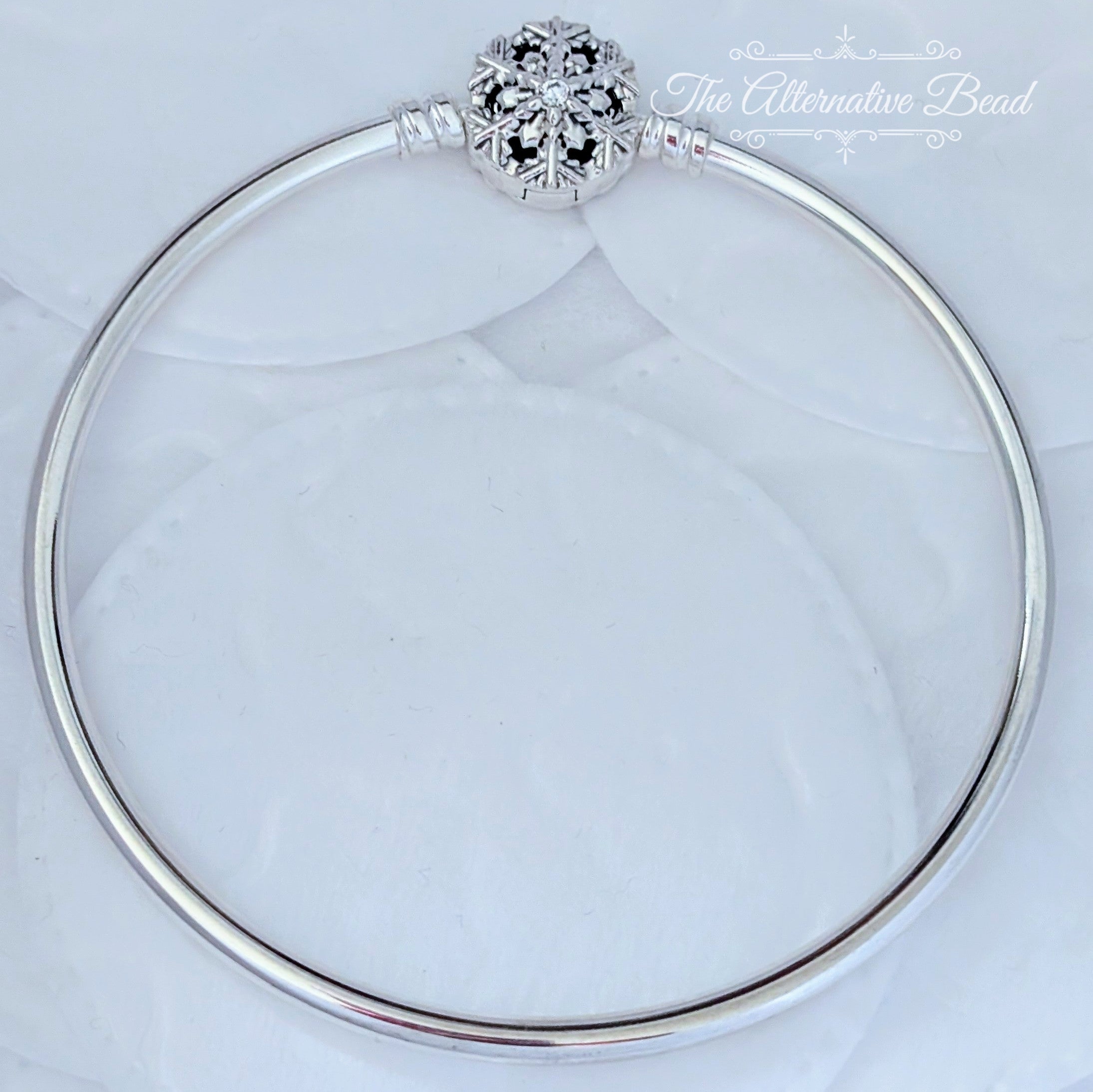Pandora Moments Sparkling Snowflake Clasp Bangle (592286C01) silver sterling-silver Bangle by The Alternative Bead. Your Jewelry Retailer from Germany