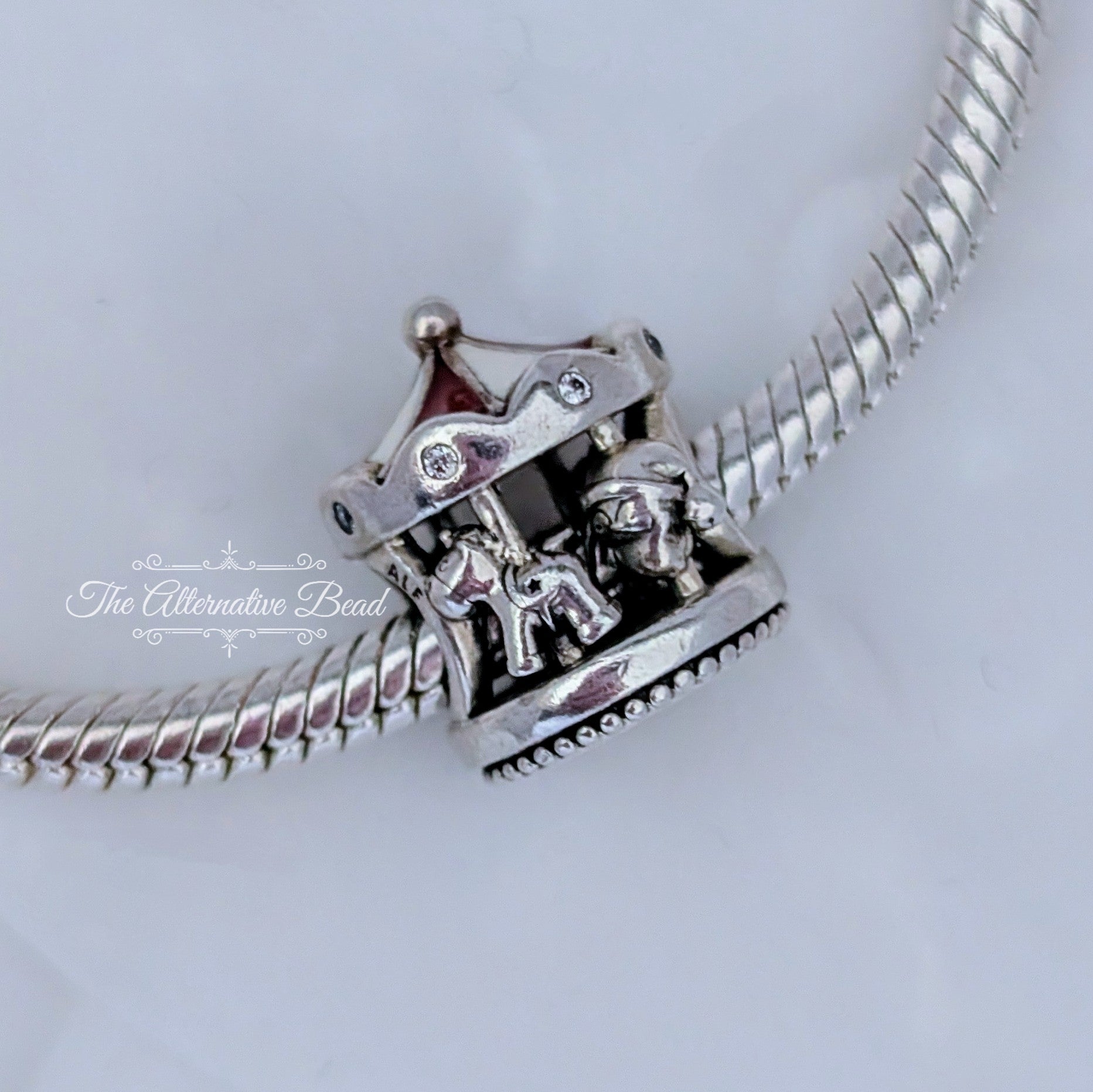 Pandora Christmas Carousel silver; red sterling-silver Bead by The Alternative Bead. Your official Pandora Retailer from Germany