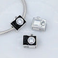 Pandora Camera Silver Charm with Black Enamel and Cubic Zirconia (791709CZ) silver and black sterling-silver and enamel Bead by The Alternative Bead. Your Jewelry Retailer from Germany