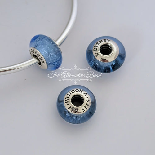 Disney x Pandora Cinderella silver charm with blue fluorescent Murano glass (791640) blue glass Bead by The Alternative Bead. Your Jewelry Retailer from Germany