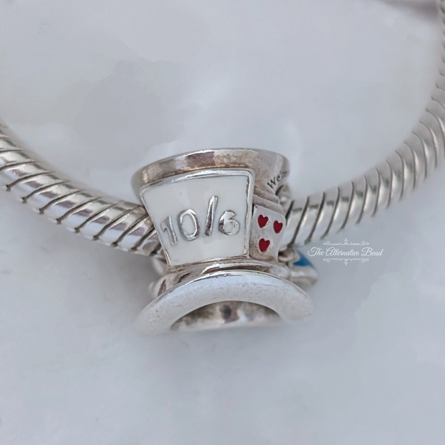 Disney x Pandora Disney Alice in Wonderland & The Mad Hatter's Tea Party Charm silver; pink; purple sterling-silver; enamel Bead by The Alternative Bead. Your official Disney x Pandora Retailer from Germany