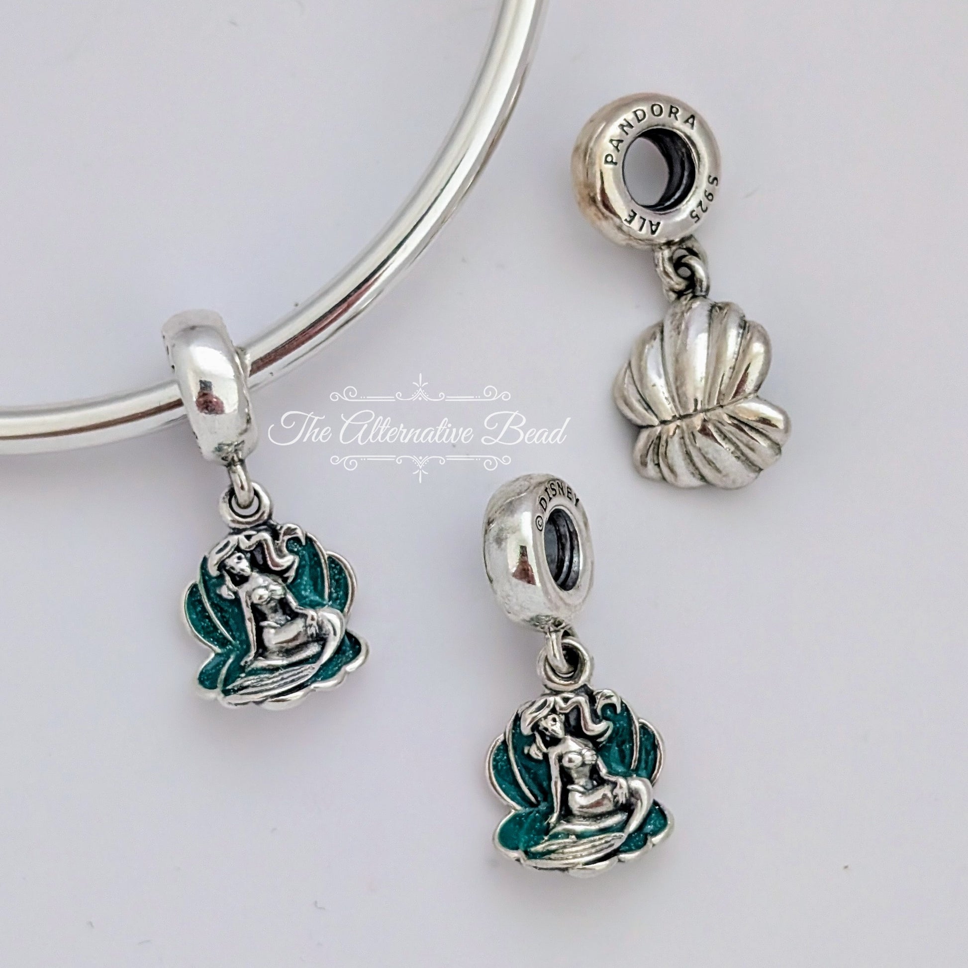 Disney x Pandora Ariel & Seashell Dangle green; silver sterling-silver Dangle by The Alternative Bead. Your official Disney x Pandora Retailer from Germany