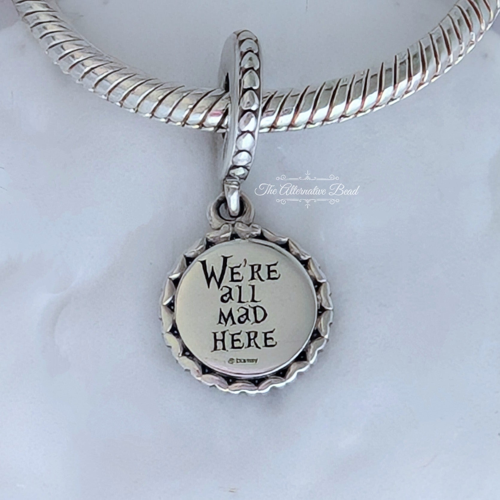 Disney x Pandora Cheshire Cat We're All Mad Here Dangle silver; pink; black sterling-silver; enamel Dangle by The Alternative Bead. Your official Disney x Pandora Retailer from Germany