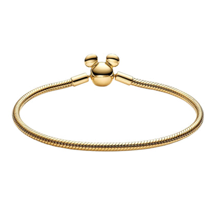 Disney x Pandora Disney Mickey Mouse Clasp Moments Snake Chain Bracelet gold gold-plated Bracelet by The Alternative Bead. Your Jewelry Retailer from Germany