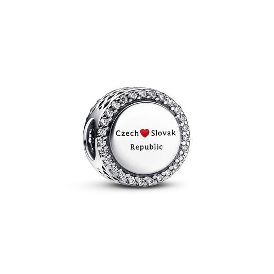 Silver charm with 'Czech Slovak Republic' text on a white background