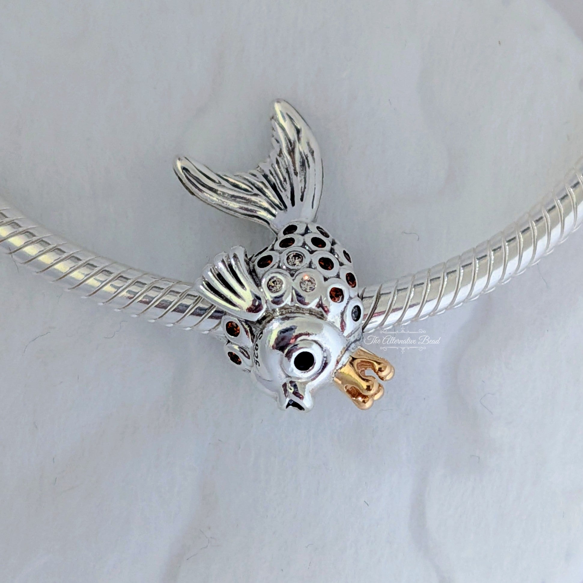 Pandora Fairytale fish silver charm with 14k, orange and golden coloured cubic zirconia and black crystal silver; gold sterling-silver; gold; crystal Bead by The Alternative Bead. Your Jewelry Retailer from Germany