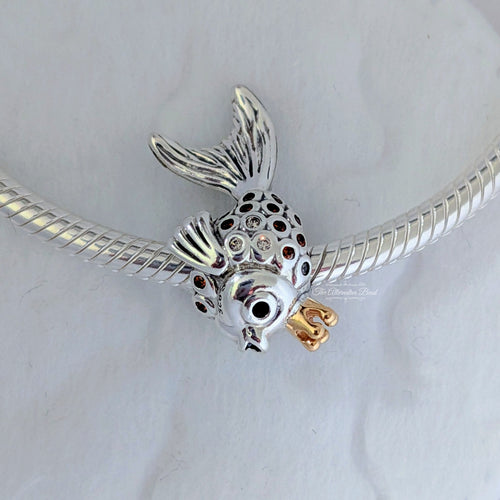 Pandora Fairytale fish silver charm with 14k, orange and golden coloured cubic zirconia and black crystal silver and gold sterling-silver and gold and crystal Bead by The Alternative Bead. Your Jewelry Retailer from Germany