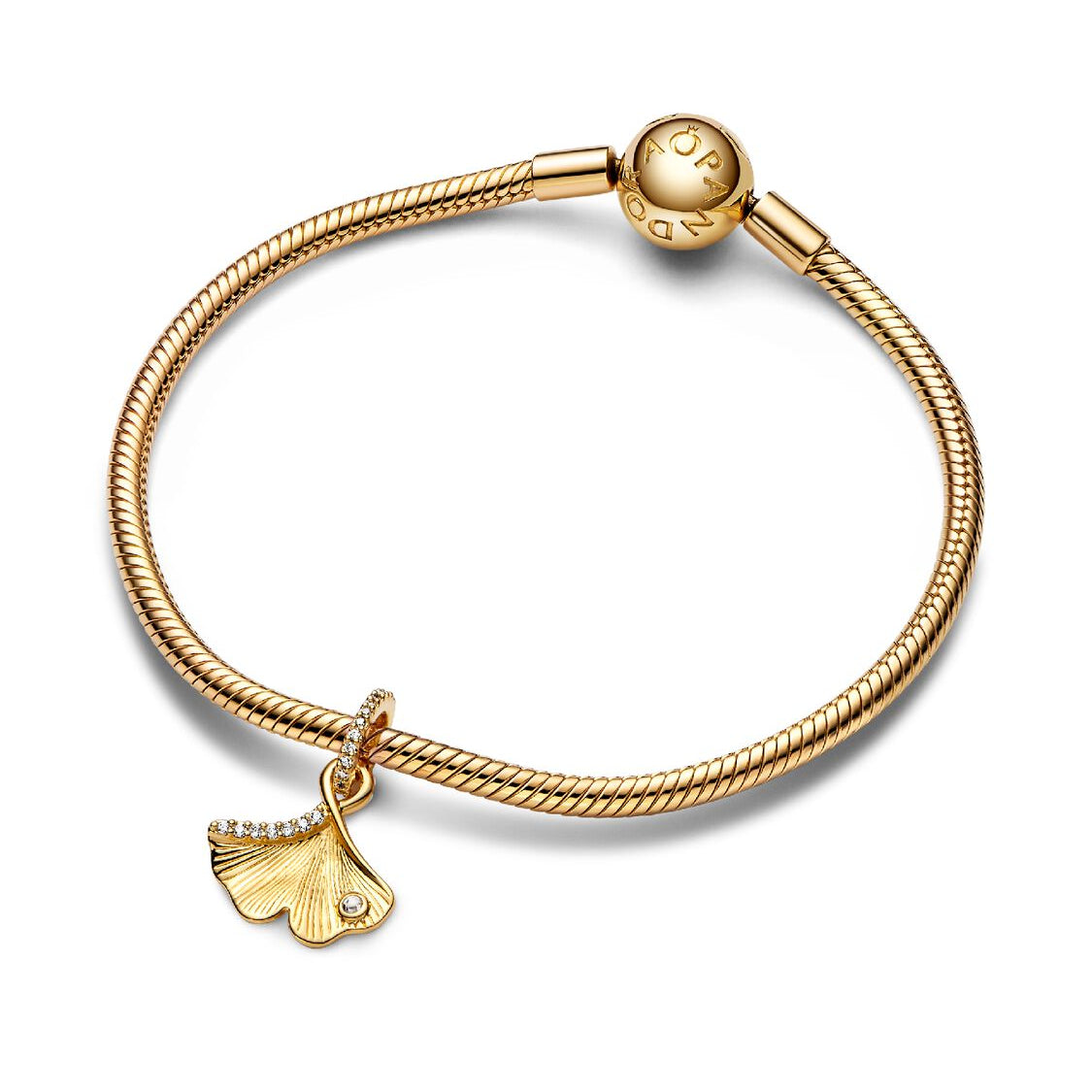 Gold bracelet with a ginkgo leaf charm on a white background