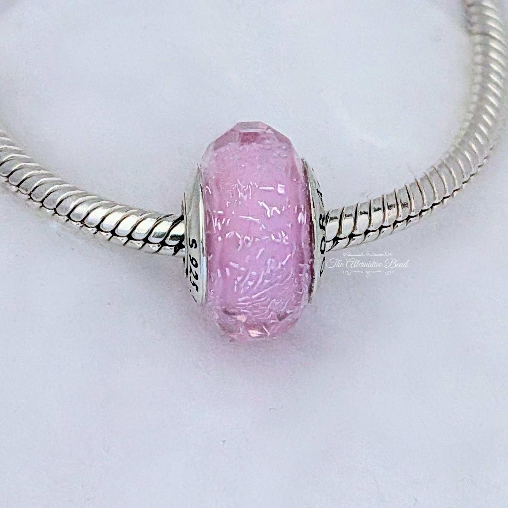 Pandora Faceted Iridescent Pink Murano Glass Charm pink glass Bead by The Alternative Bead. Your official Pandora Retailer from Germany