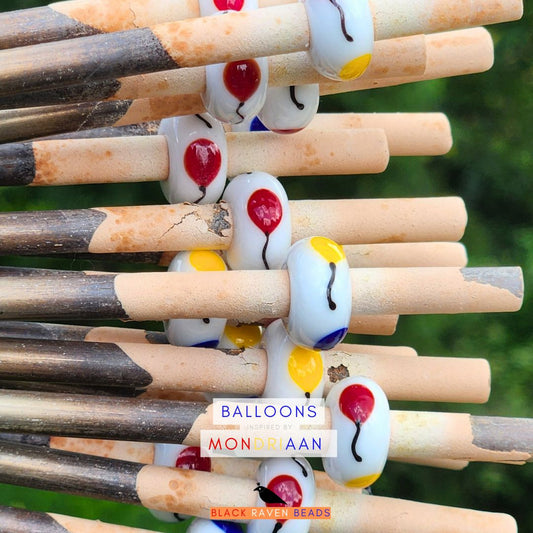 Black Raven Beads Mondriaan Balloons white; red; yellow; blue glass Bead by The Alternative Bead. Your official Black Raven Beads Retailer from Germany
